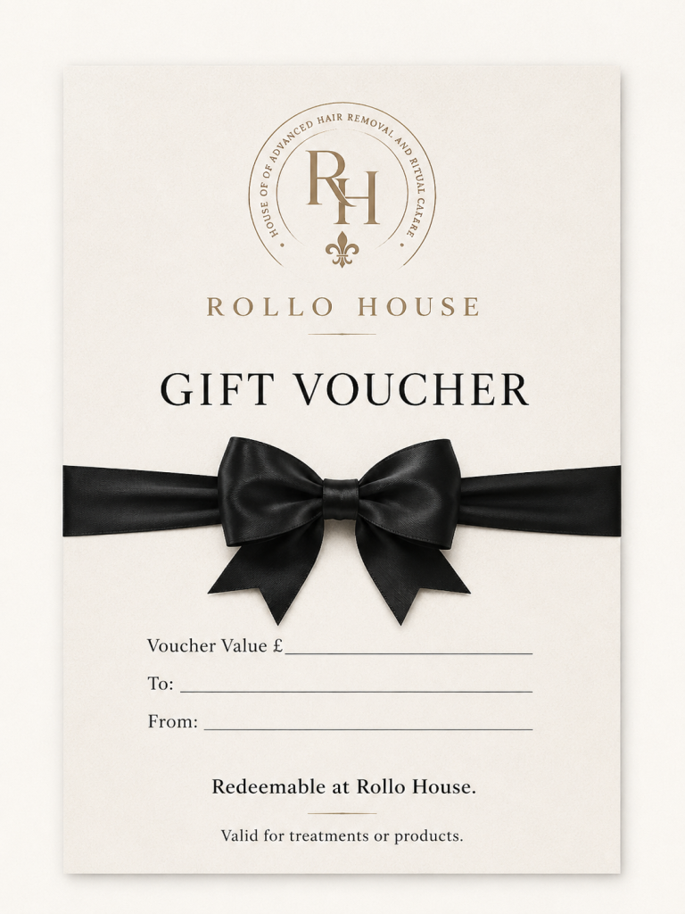 Rollo House gift voucher, cream card with black ribbon bow and antique gold monogram